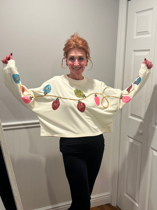 The Merry & Lit Sweatshirt